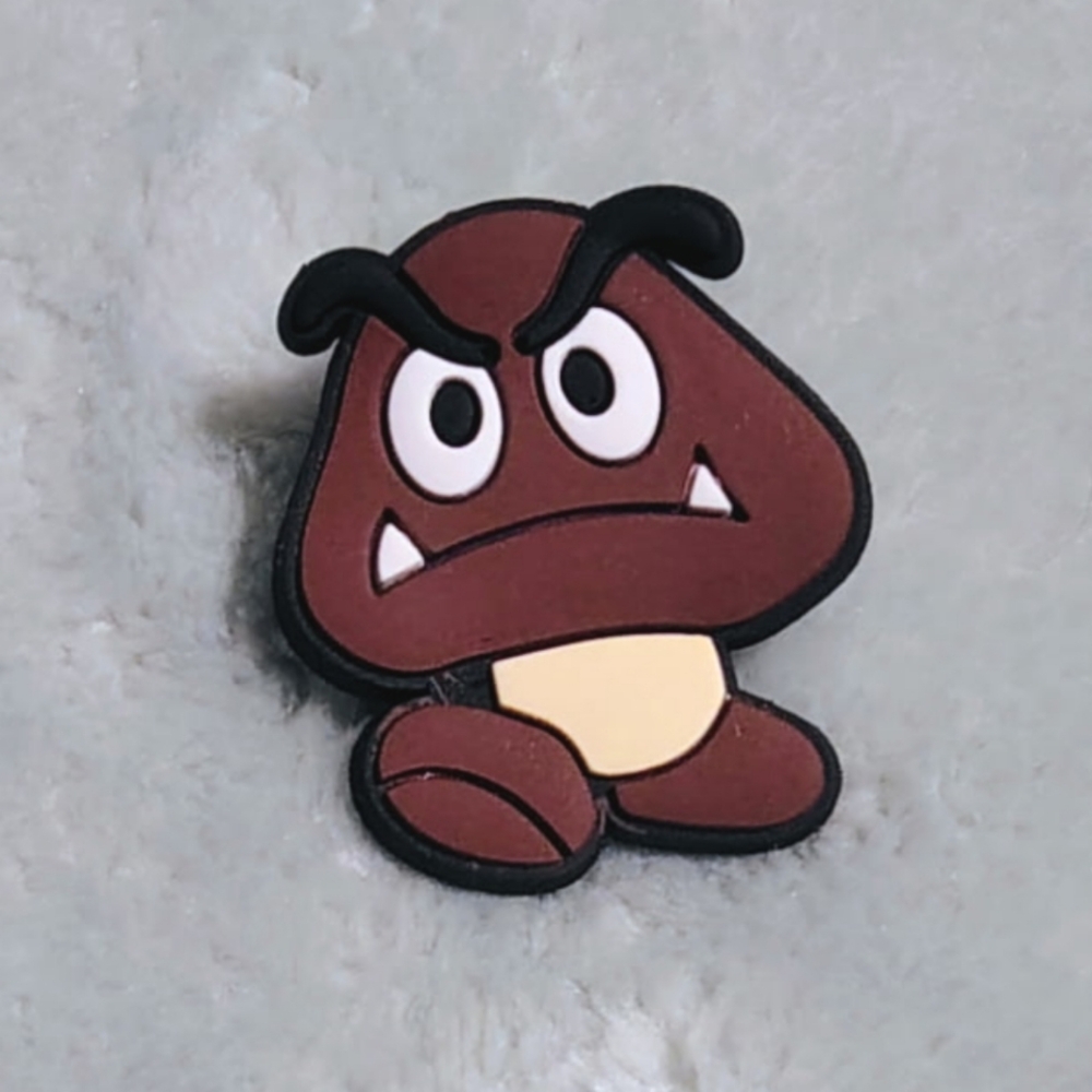 3/$10 🤎 Goomba Croc Charm